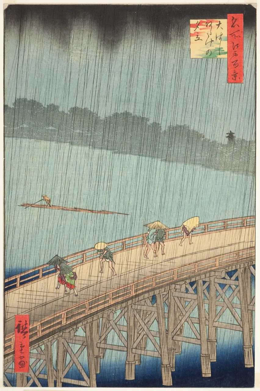 People hurry across a long wooden bridge under umbrellas and straw mats as dark slanting rain falls over the river.